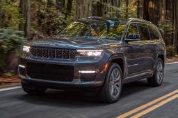 2021 Jeep Grand Cherokee L Summit Reserve driving in the woods